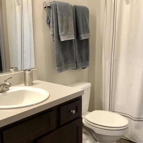 Bathroom options with thoughtful details well lit bathroom with shower/tub combo